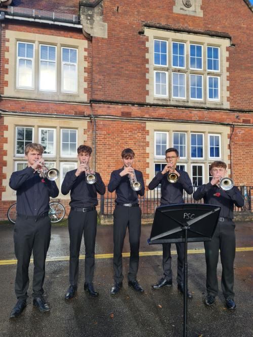 Symonds trumpeters Felix Thomson, Ptolemy Grevitt, Simon Lloyd, Daniel Tickle and Jacob Gibbs outside Northbrook Building.